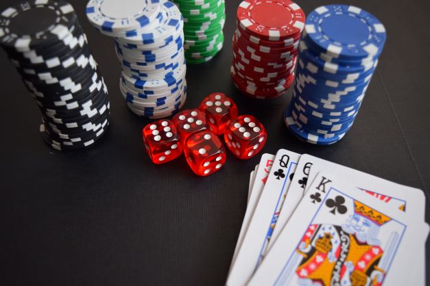 Cards and betting chips on table 